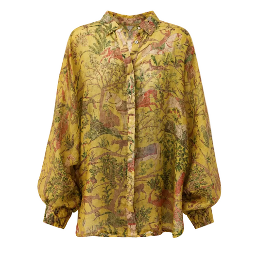 Yellow patterned blouse on a white background