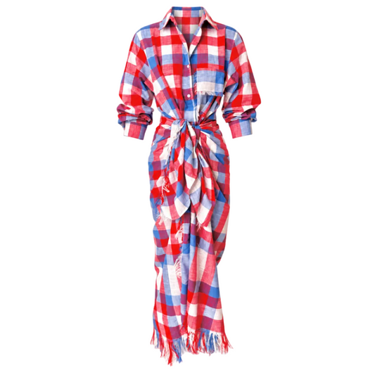 A red, white, and blue plaid long-sleeve shirt dress with a tie waist and fringed hem, shown on a plain white background.