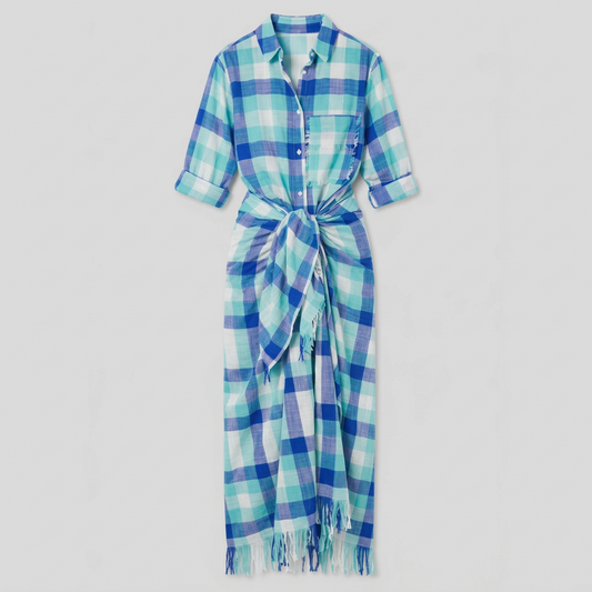 A long-sleeve plaid shirt dress in shades of blue, green, and white, featuring a button-down front, chest pocket, and a self-tie belt at the waist.
