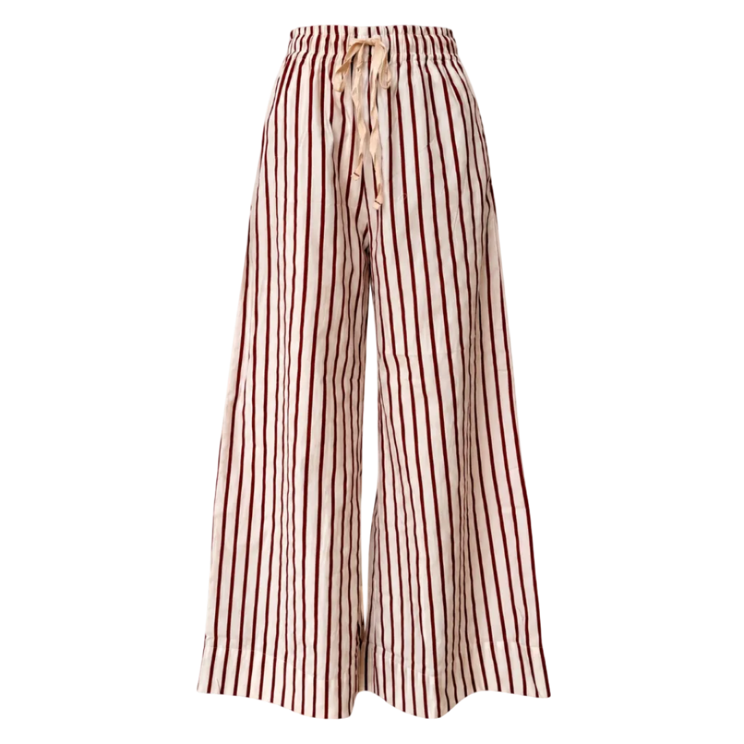 A pair of wide-leg trousers featuring vertical dark red stripes on a cream base, with a matching cream drawstring at the elastic waistband, shown against a plain white background.
