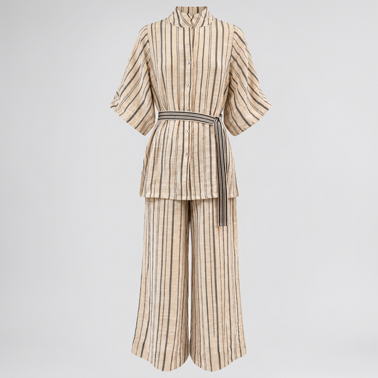 A beige and brown vertically striped two-piece set featuring a short-sleeve button-front top with a tie belt and matching wide-leg pants, shown on a plain white background.