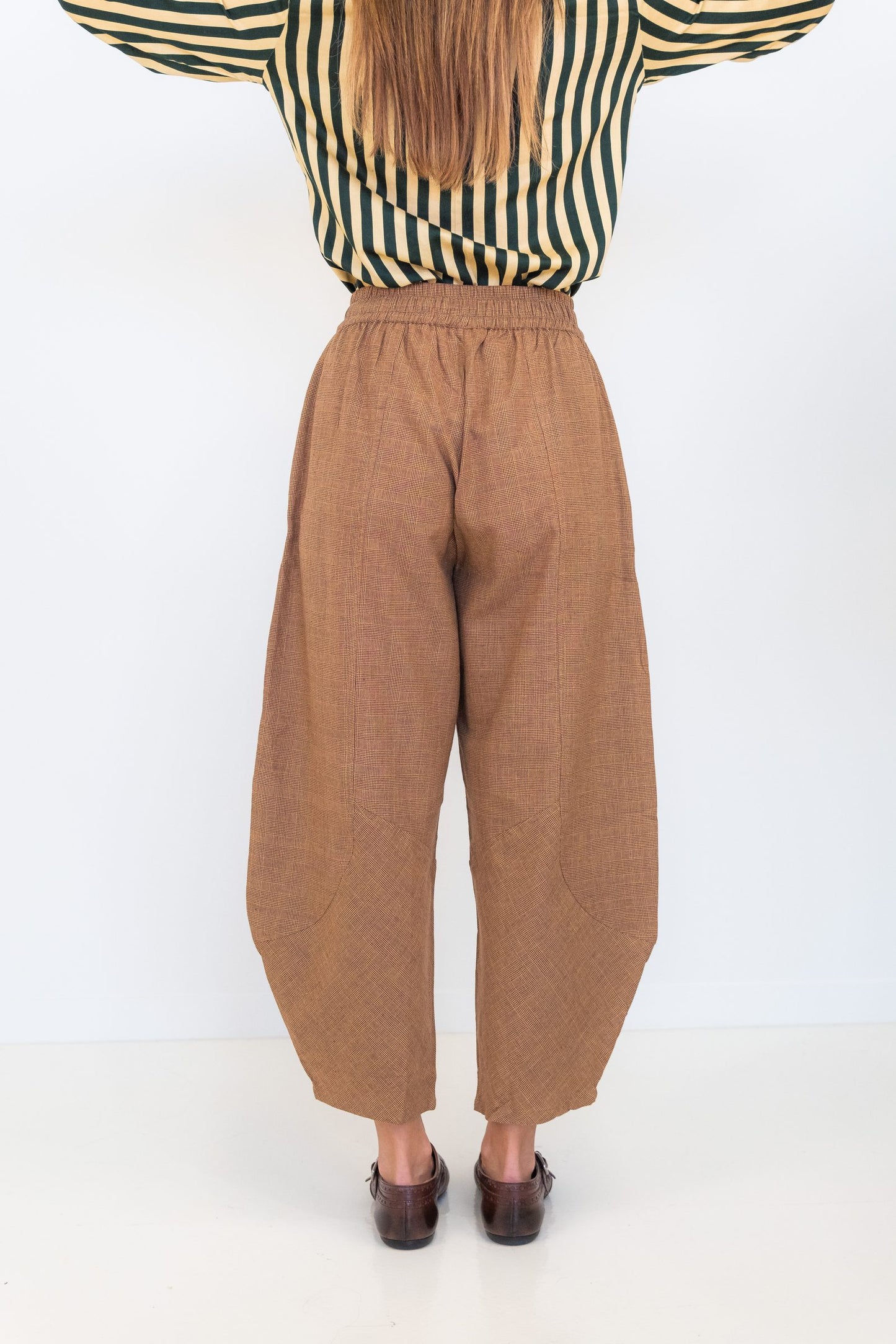 Back view of Chocolate Prince of Wales barrel pants with an elasticated waistband.
