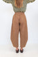 Back view of Chocolate Prince of Wales barrel pants with an elasticated waistband.