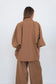 Back view of the Chocolate Prince of Wales Butterfly Shirt, showing its relaxed oversized silhouette and check pattern.