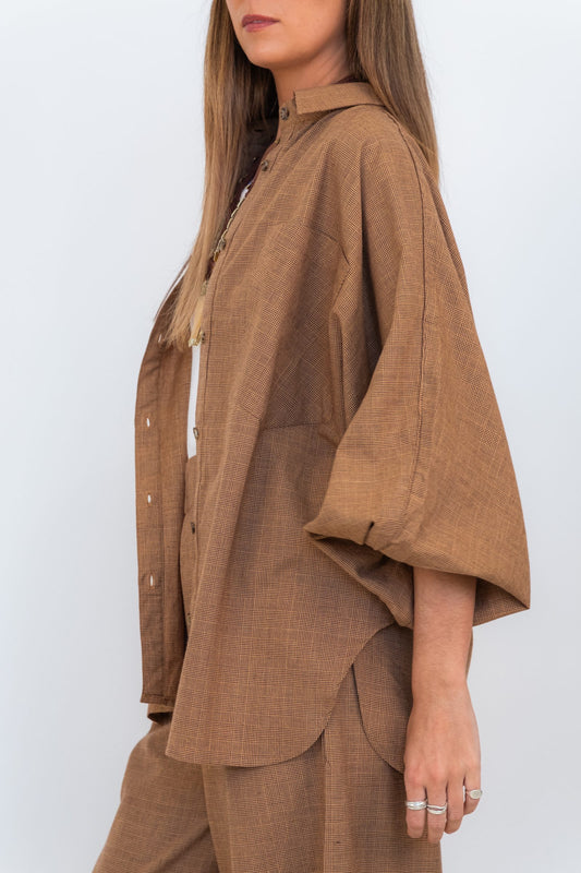 Side view of the Chocolate Prince of Wales Butterfly Shirt, showing the relaxed oversized fit and butterfly sleeve.