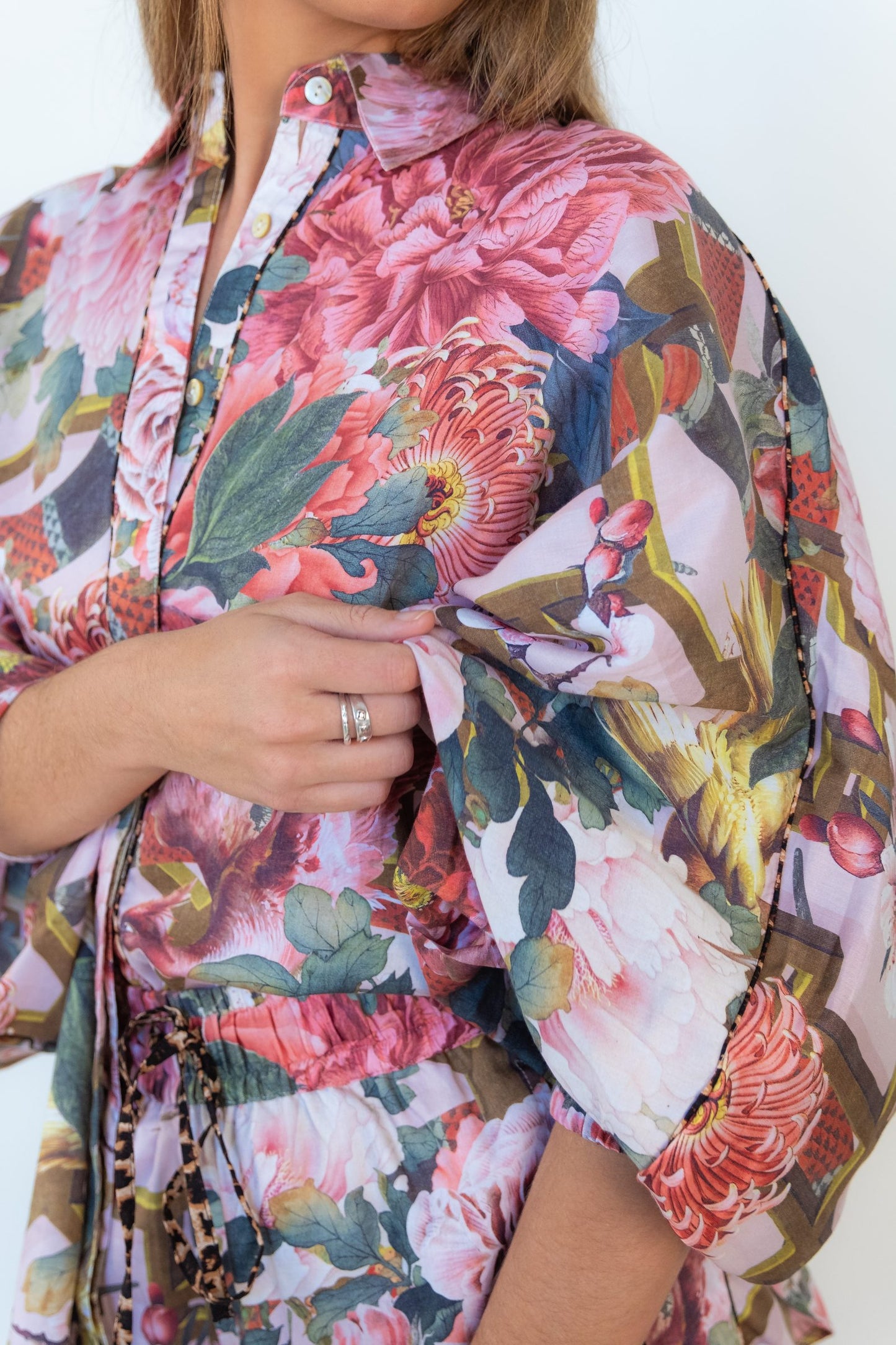 Close-up of the butterfly sleeve and elasticated cuff on the Ophelia Pink Butterfly Shirt.