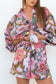 Close-up front view of the Ophelia Pink Butterfly Shirt showing the floral print, button-through front, and relaxed fit.