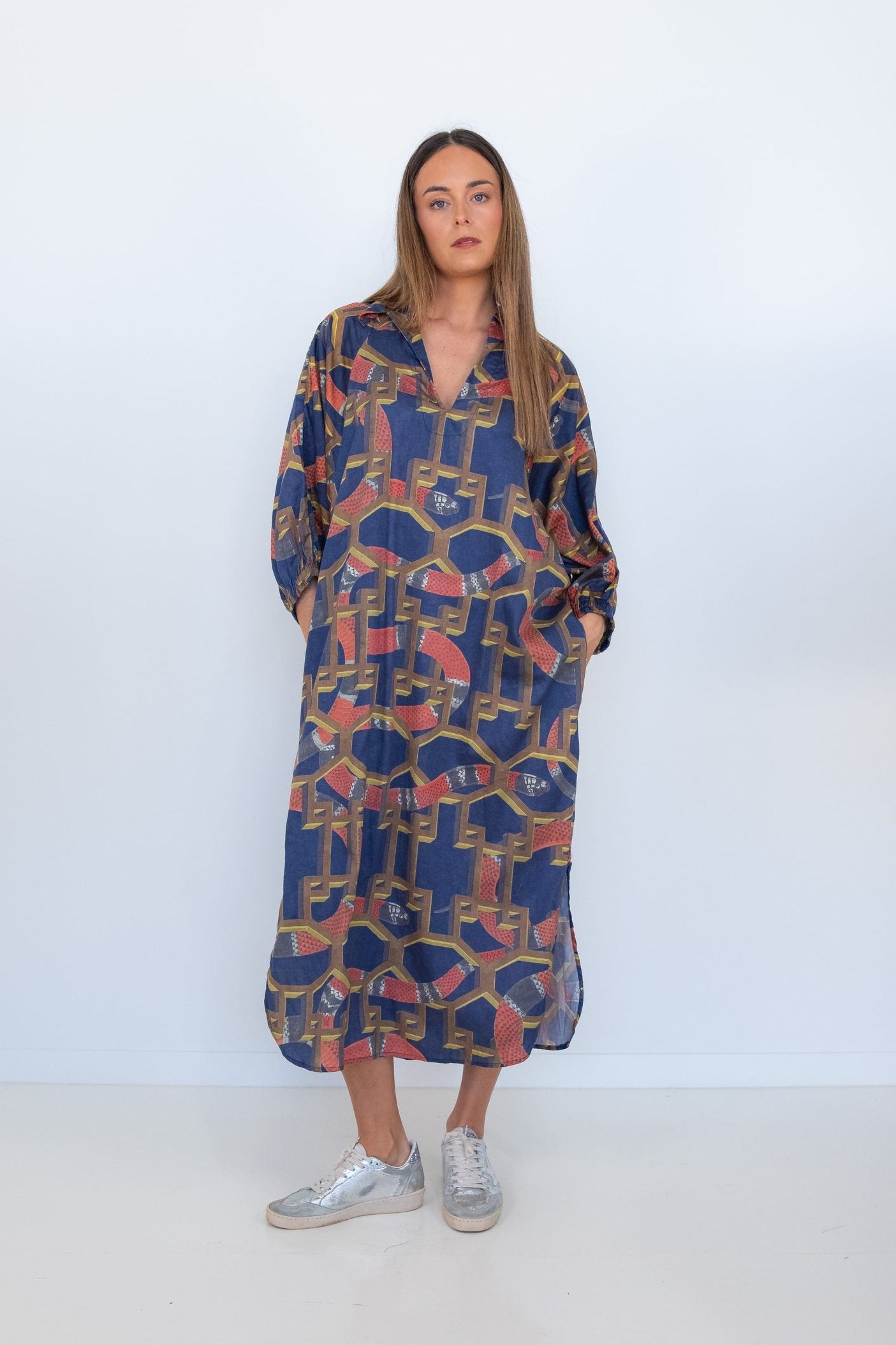 Full-length front view of a model wearing the Ophelia Snakes Butterfly Dress.