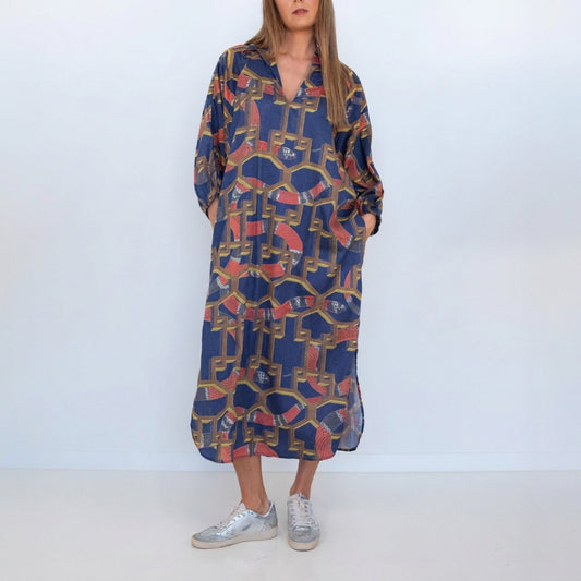 Full-length front view of a model wearing the Ophelia Snakes Butterfly Dress.