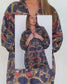 Model showcasing the relaxed butterfly silhouette of the Ophelia Snakes Butterfly Dress.